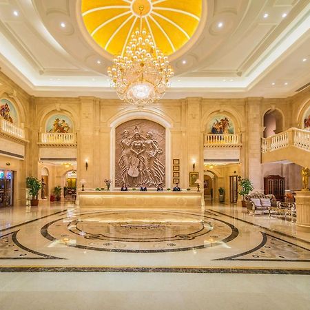 Vienna International Hotel Ningbo Wanda Bagian luar foto