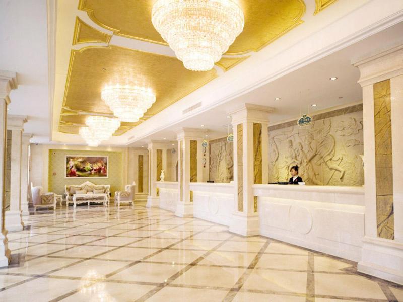 Vienna International Hotel Ningbo Wanda Bagian luar foto