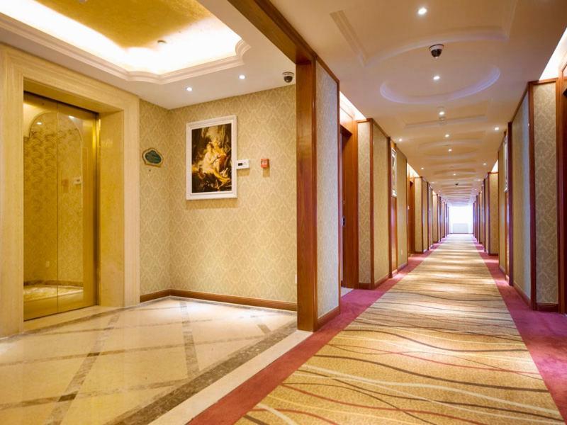 Vienna International Hotel Ningbo Wanda Bagian luar foto